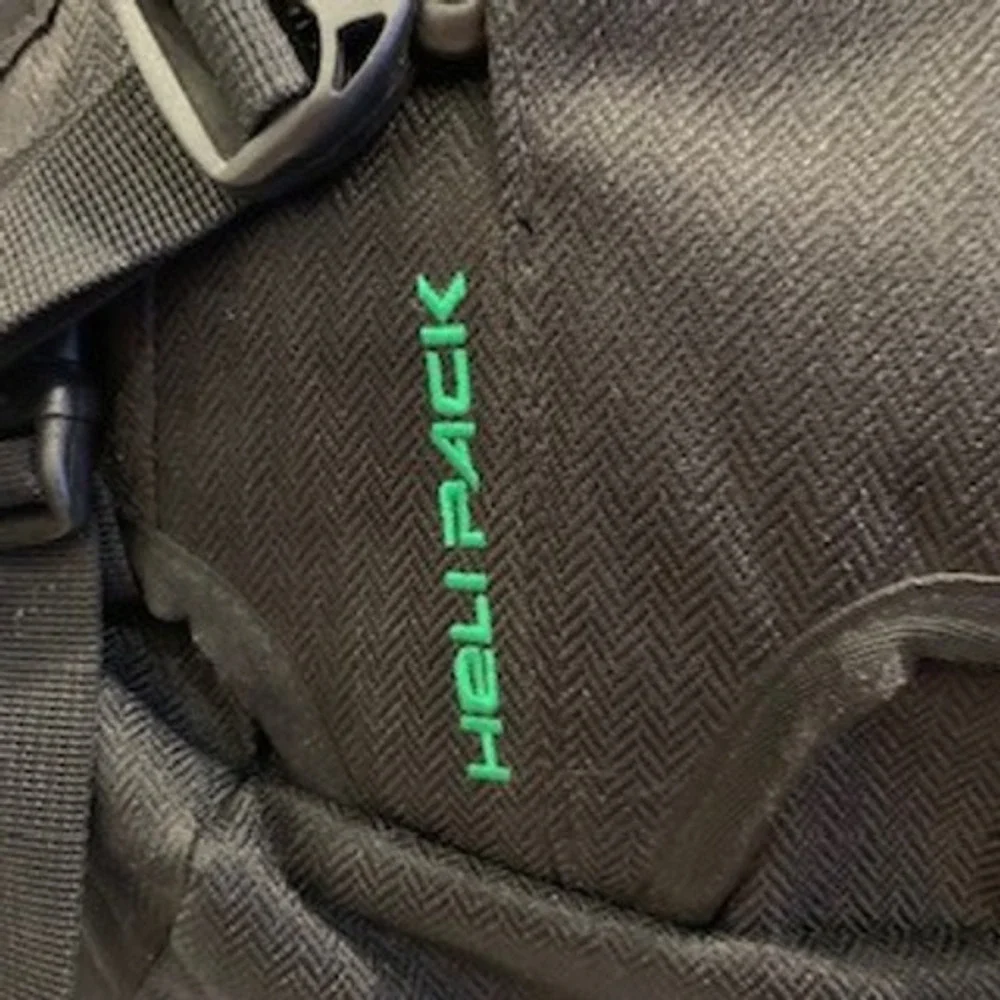Dakine Heli Pack 11L Backpack Black Rasta Snowboard Ski Carry Daypack 8100700
